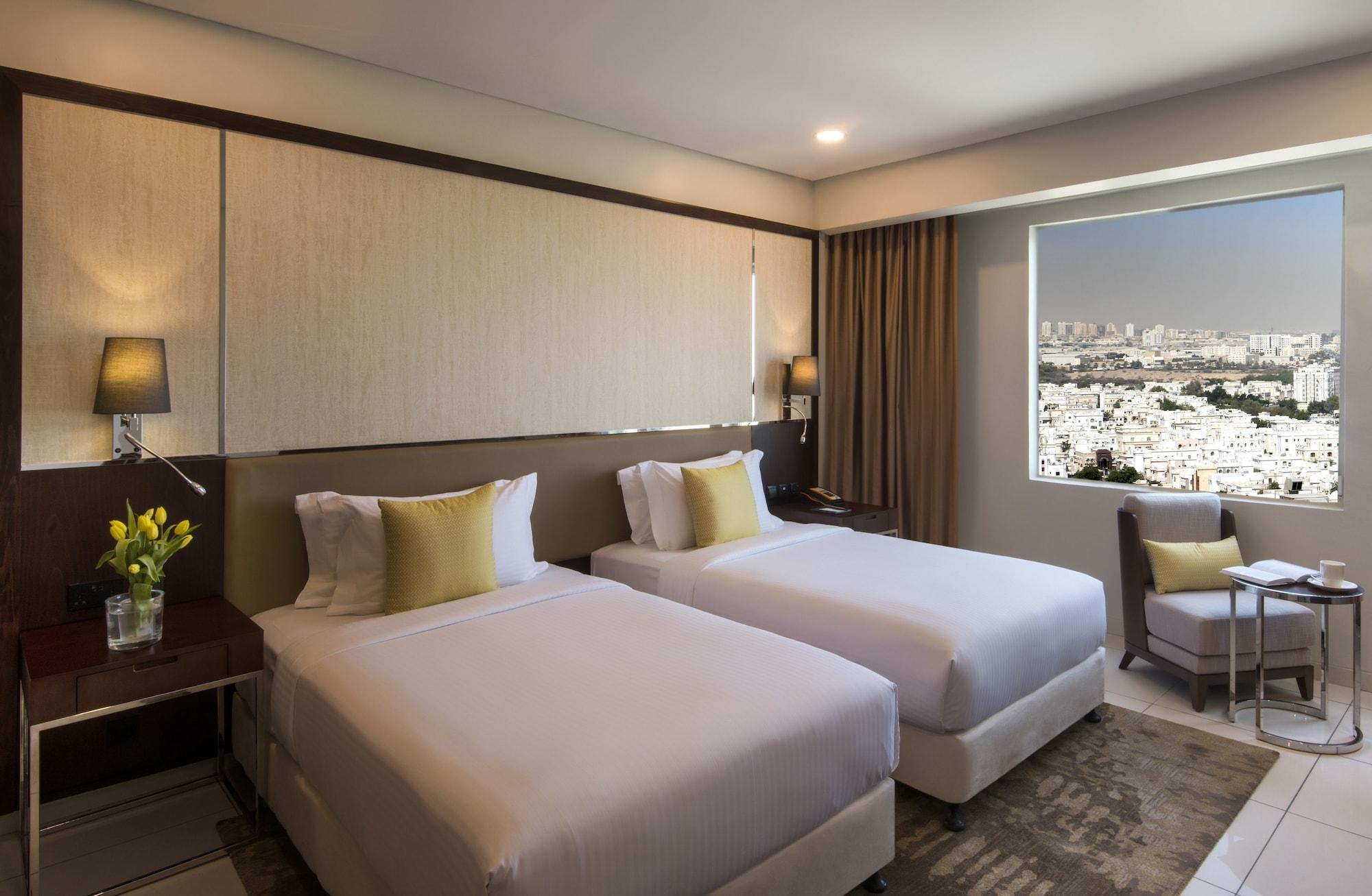Fraser Suites Maszkat Kültér fotó Deluxe Room