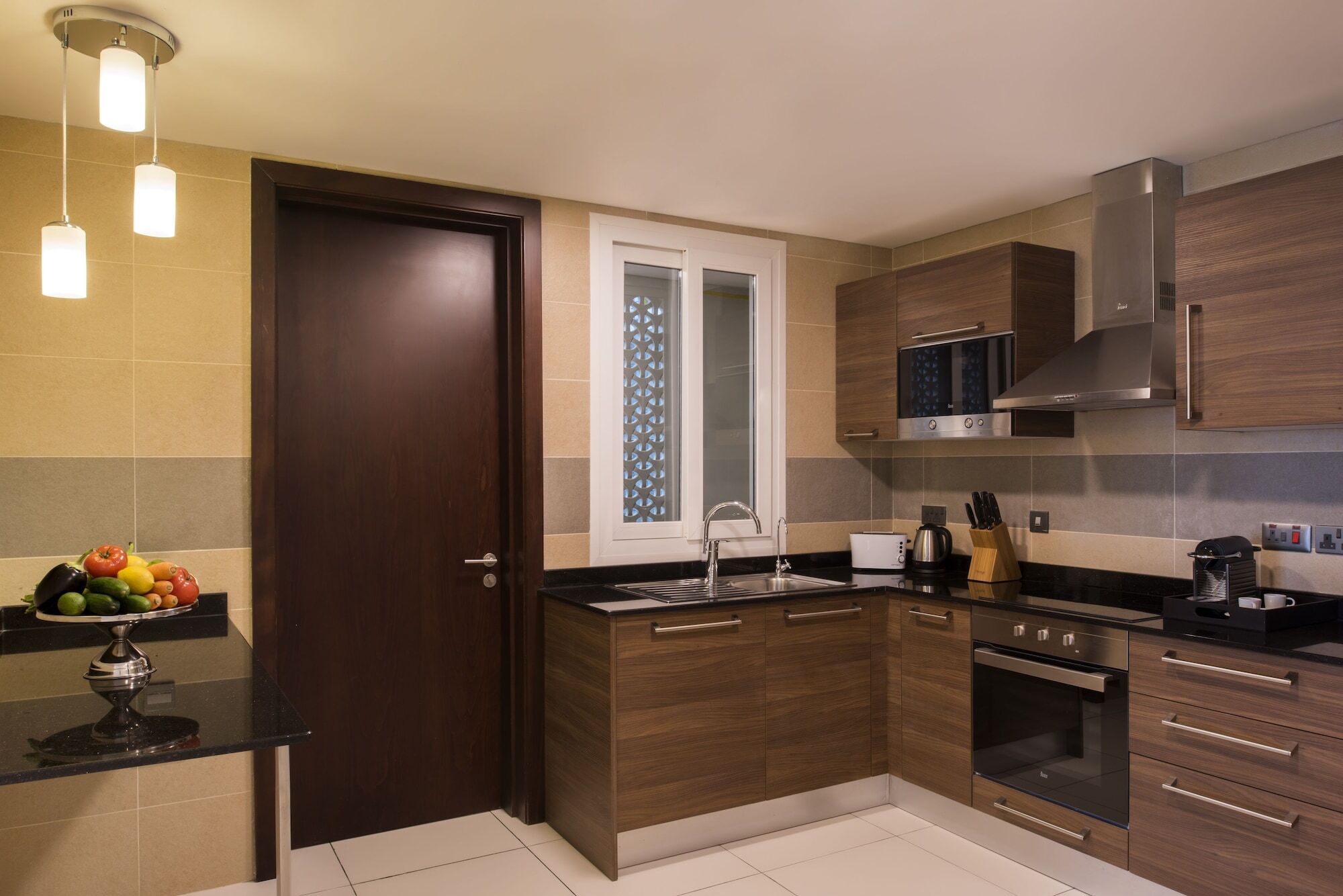Fraser Suites Maszkat Kültér fotó A modern kitchen
